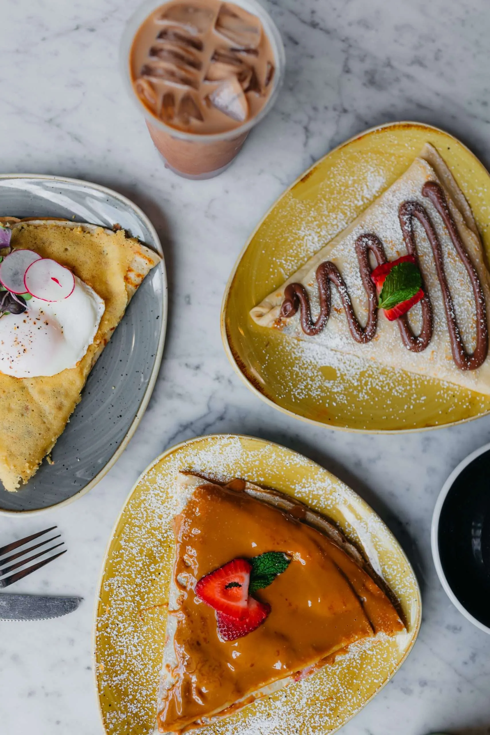 An assortment of sweet and savory crepes at The Crepe Shop